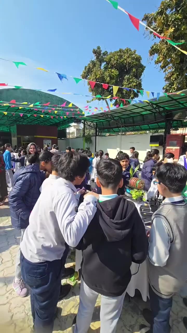 Crowd of excited kids at the outdoor 3D printing exhibition